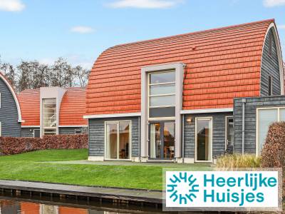 Comfortabele bungalow voor 10 personen met wellness en terras aan het water in Drenthe