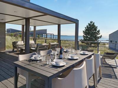 Villa 68 – Secret | Verscholen tussen de duinen met uitzicht over het water