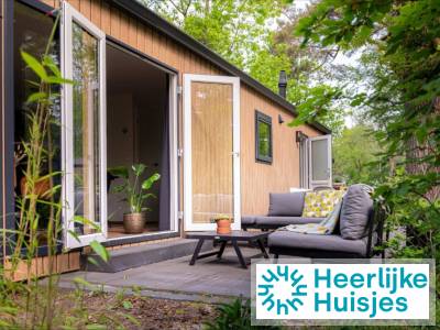 Sfeervol 6-persoons boshuis met open haard en omheinde tuin in Nunspeet, op de Veluwe