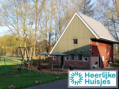 Mooi 12 persoons vakantiehuis midden in het bos in Drenthe met hottub
