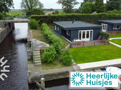 Aan de rivier de Tjonger gelegen 4 pers. vakantiehuis inclusief boot in Bantega, Friesland