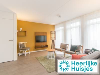Appartement met twee verdiepingen met buitenlounge en barbecue op resort bij Maastricht