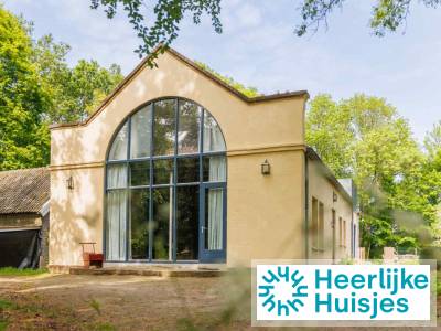 Luxe 10-persoons koetshuis met hottub incl. ontbijt op Iepenoord, dichtbij strand en bos