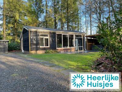 Luxe 4 persoons vakantiehuis met buitenspa in de bossen nabij Epe op de Veluwe.