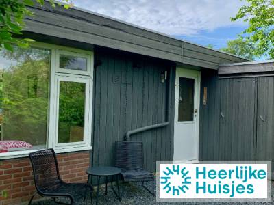 Sfeervolle 6-persoons bungalow met open haard op rustig park nabij kust in Noord Holland