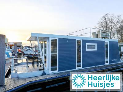 Comfortabele 4-persoons havenlodge aan het water in Amsterdam-Zuid met dakterras