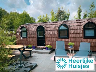 Unieke 2 persoons Tiny House op kleinschalig erf met privé hottub en sauna in Almere