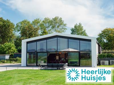 Sfeervolle 8 persoons woning met zonnig terras en weids uitzicht nabij duin, bos en meer