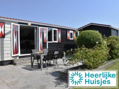 Ruim chalet voor 5 personen met airco en privΓ©terras in Serooskerke