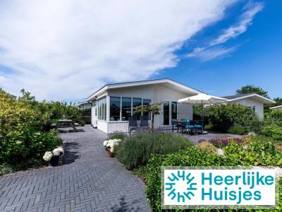4 persoons strandhuis op park met zwembad en internet.