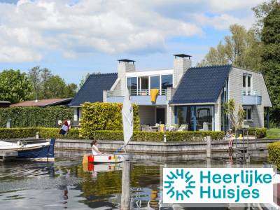 Comfortabel 4-persoons appartement op een park aan het water met haven dichtbij Amsterdam