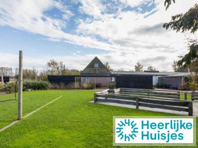 Modern ingericht 8 persoons vakantiehuis op een kleinschalig vakantiepark bij Serooskerke