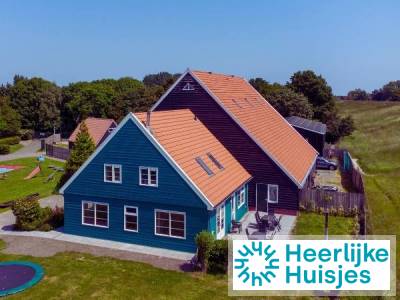 Ruime 16-persoons boerderij met hottub en omheinde tuin op vakantiepark IJsselhof