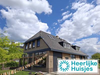 Luxe groepsaccommodatie met 4 vakantiehuizen voor 36 personen in Scherpenzeel.