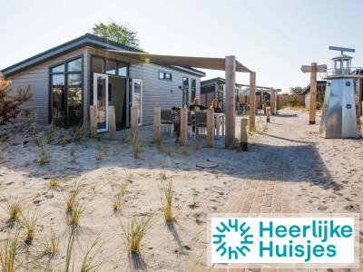 Charmant 6 persoons chalet op park met zwembad en internet