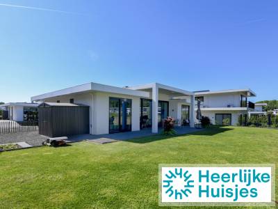 Villa voor 8 personen aan het water met zwemsteiger op vakantiepark vlakbij Harderwijk