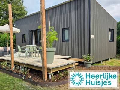 Sfeervol 4-persoons tiny house met hottub en airco op kleinschalig park in Zuid-Limburg