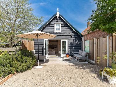 Vakantiewoning Vrouwenpolder | lichte moderne woning met grote tuin voor 4 personen | Schoolstraat 6A