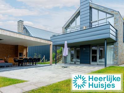 Villa met balkon en lounge met buitenkeuken voor 6 personen op resort vlakbij Maastricht