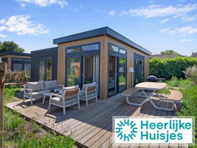 Gezellige 6-persoons vakantiewoning met airco, een tuin met loungebank en een barbecue
