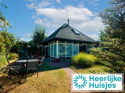 Sfeervol 4-persoons vakantiehuis met grote tuin in Ouddorp nabij het strand