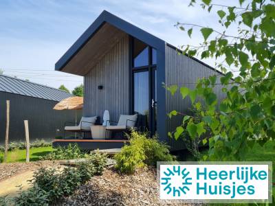 Modern 4-persoons tiny house met hottub en airco op klein vakantiepark vlakbij Maastricht