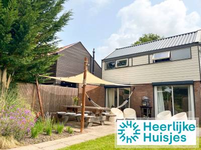 Sfeervolle 5-persoons woning met Big Green Egg vlakbij zee en aan recreatiegebied