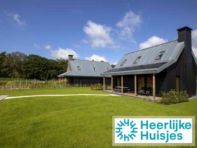 Modern vakantiehuis voor 5 personen op een familiepark met zwemvijver in Sint-Nicolaasga