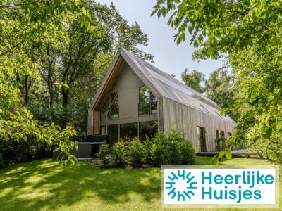 8 persoons lodge gelegen aan de bosrand met privé terras en bubbelbad